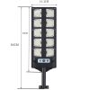 Соларна LED лампа 3000W DRAGON BK-260-10, монтирана на стена и осветяваща двор през нощта.