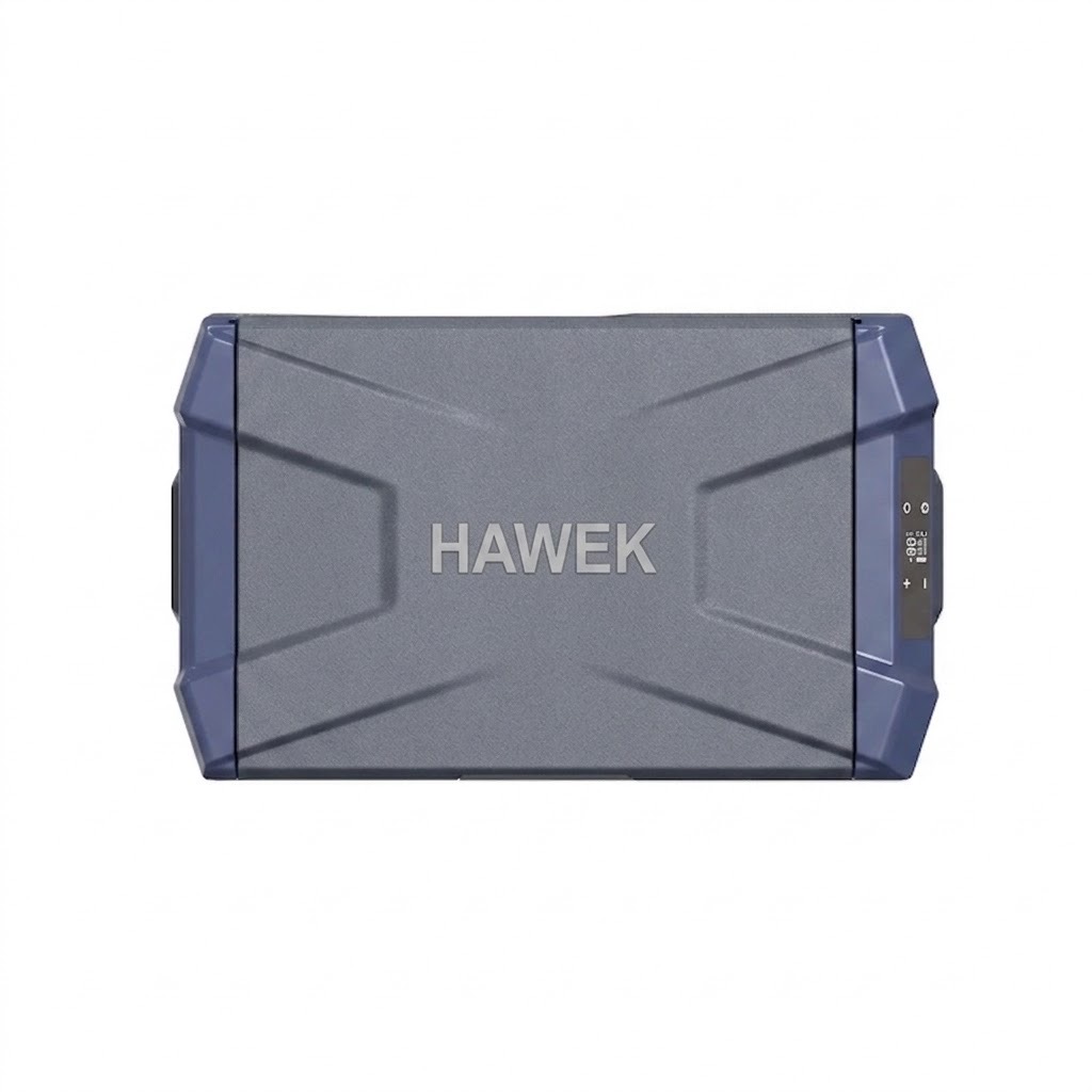 Преносим хладилник HAWEK 50L | 12V/24V/220V, компресор ДОМ И ГРАДИНА Компресорна хладилна кутия с LED дисплей и здрав корпус, поставена в каравана.