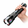 Мощен фенер COBA CB-802 с далекобоен лъч до 3 км, насочен в тъмната гора.